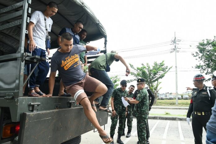 Fresh conscripts arrive at an army base in Bangkok on Nov. 1, 2019, to start their compulsory two-year service.
