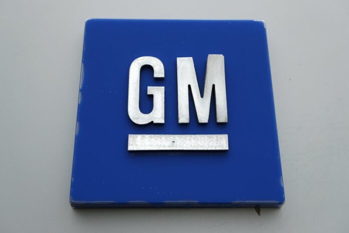 This Jan. 27, 2020, file photo shows a General Motors logo at the General Motors Detroit-Hamtramck Assembly plant in Hamtramck, Mich. (AP Photo/Paul Sancya, File)