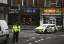 Man Wearing Fake Bomb Stabs 2 in London, Shot to Death