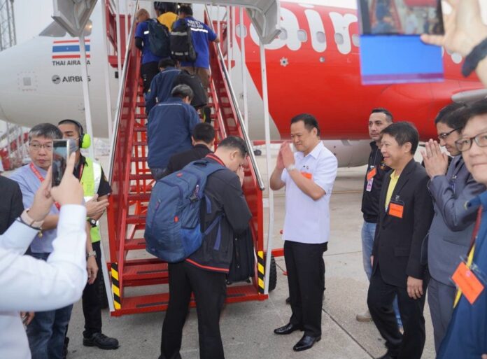 Health minister Anutin Charnvirakul sends off a medical team bound for Wuhan at Don Mueang Airport in Bangkok, Feb. 4, 2020.