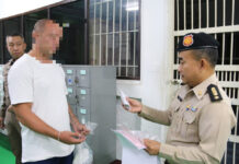 Officials Say British Convict Not Infected by Coronavirus Photo released by the Department of Corrections shows British citizen Mark Rumble at Bangkok Remand Prison prior to his extradition, with his face blurred out.