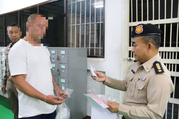 Photo released by the Department of Corrections shows British citizen Mark Rumble at Bangkok Remand Prison prior to his extradition, with his face blurred out.
