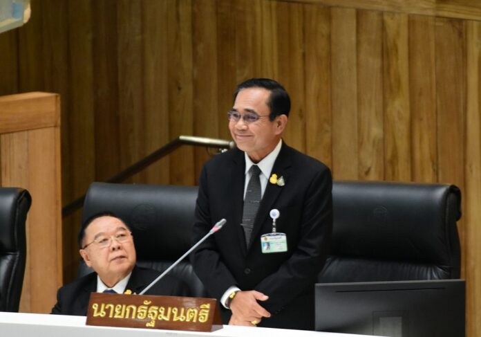 PM Prayut Chan-o-cha addresses the Parliament on Feb. 24, 2020.
