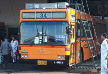 Bangkok Buses to Install Rooftop Air Purifiers Despite Pseudoscience Claims A bus fitted with an air-filtration system on top of its roof.