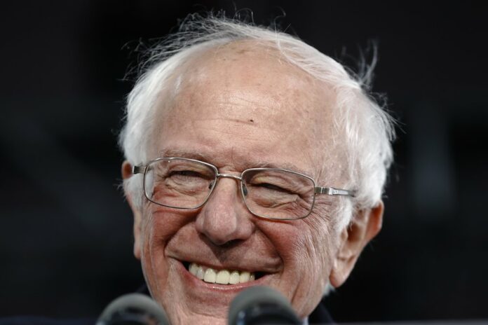 Democratic presidential candidate Sen. Bernie Sanders, I-Vt., speaks to supporters at a caucus night campaign rally in Des Moines, Iowa, Monday, Feb. 3, 2020. (AP Photo/Matt Rourke)