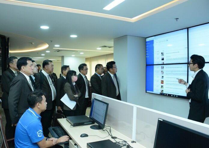 Telecommunication officials visit the government Anti-Fake News Center on Nov. 24, 2020.