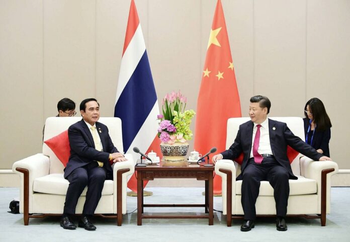 PM Prayut Chan-o-cha meets with Chinese president Xi Jinping in Hangzhou, China, on Sep. 4, 2016.