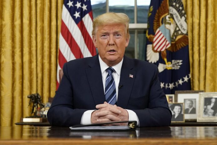 President Donald Trump speaks in an address to the nation from the Oval Office at the White House about the coronavirus Wednesday, March, 11, 2020, in Washington. (Doug Mills/The New York Times via AP, Pool)