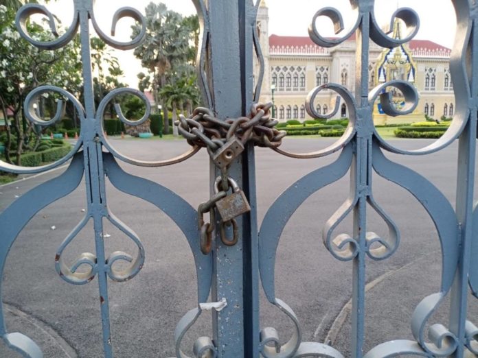 The locked gate at Government House on March 30, 2020.