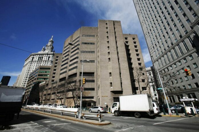 FILE- This March 12, 2009 photo shows the Metropolitan Correctional Center in New York City. The federal jail in New York City where wealthy financier Jeffrey Epstein took his own life is on lockdown as authorities try to determine whether someone smuggled a gun inside one of the most secure federal jails in the country. That's according to two people familiar with the matter who spoke Friday to The Associated Press. Photo: Mark Lennihan / AP