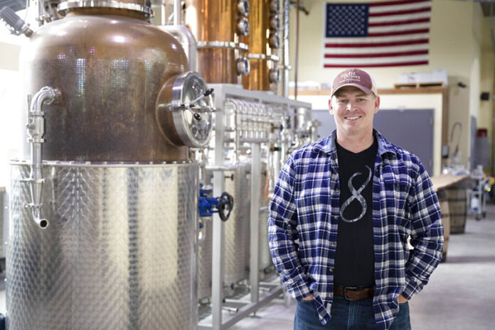 Chad Butters, founder of Eight Oaks Farm Distillery, poses for a photo at their facility in New Tripoli, Pa., Monday, March 16, 2020. Butters, who grew increasingly angry as he saw the skyrocketing price of hand sanitizer, has decided to do something about it: He's temporarily converting his operation into a production line for the suddenly hard-to-find, gooey, alcohol-based disinfectant. Photo: Matt Rourke / AP