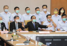 Prayut Orders ALL Travelers to Present Virus Certificate Prime Minister Prayut Chan-o-cha, center, during a meeting with health officials at the Ministry of Public Health on March 19, 2020.