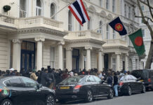 Thais Overseas Say They’re Stranded by New Virus Rule People line up in front of the Royal Thai Embassy in London. Photo: Sirada K Ning / Facebook