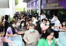 Gov’t Takes Full Control Over Distribution of Face Masks People line up to get a free packet of face masks at the Department of Medical Services in Nonthaburi province on March 3, 2020.