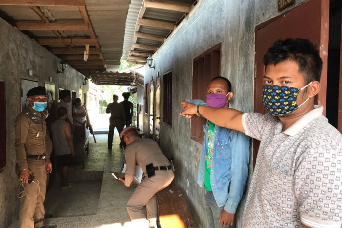 Pongsathorn Patint and Rajan Kaewkohlaba during their crime reenactment at a resort on Koh Phangan on March 20, 2020.