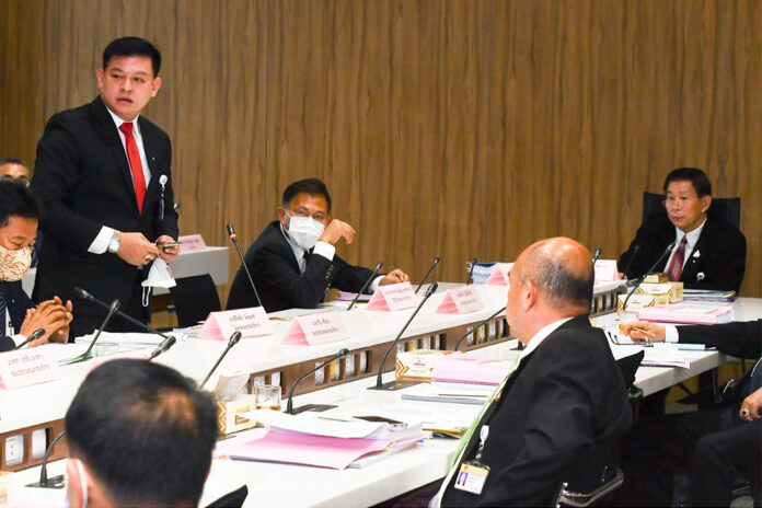 Sira Jenjaka, left, and Sereepisut Temiyaves, right, during a House Committee meeting at the Parliament on March 18, 2020.