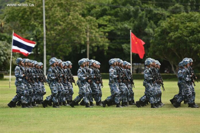 Thai and Chinese navy personnel march during the opening ceremony for a joint military exercise in Sattahip Naval Base, Chon Buri province, Thailand, on May 21, 2016. Image: Xinhua.