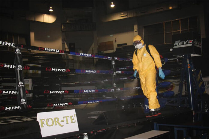 A worker disinfects Lumpinee Boxing Stadium. Photo: Lumpinee Boxing Stadium / Facebook