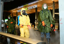Coronavirus Cases in Thailand Jump Above 300, Expected to Rise Soldiers disinfect a bus stop in front of Future Park shopping mall in Pathum Thani province on March 20, 2020.