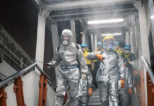 2 More Medical Workers Infected With Coronavirus Army chief Gen. Apirat Kongsompong, left, and soldiers disinfect BTS Ari Station on March 24, 2020.