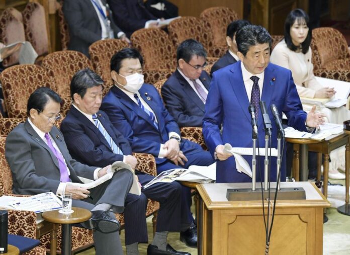 Japanese Prime Minister Shinzo Abe addresses Parliament in Tokyo, Japan, March 23, 2020. (Kyodo News/Handout via Xinhua)