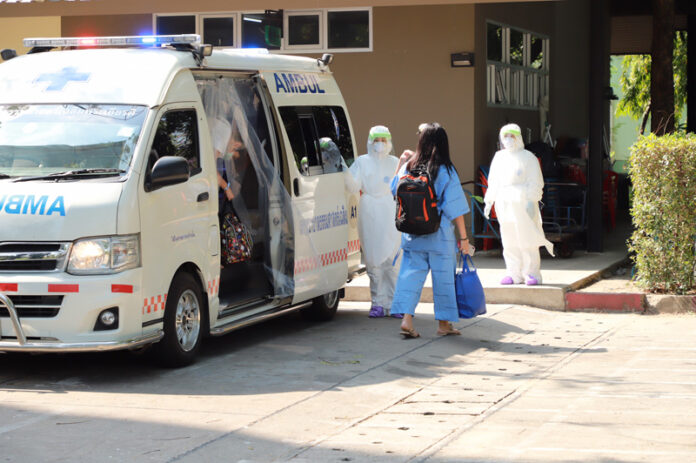 A coronavirus patient arrives at the Thammasat University Field Hospital for Covid-19.