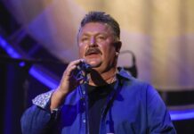 Online Conspiracy Theorists Twist Singer’s COVID-19 Death
