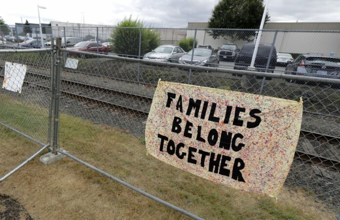This July 10, 2018 file photo shows a sign that reads