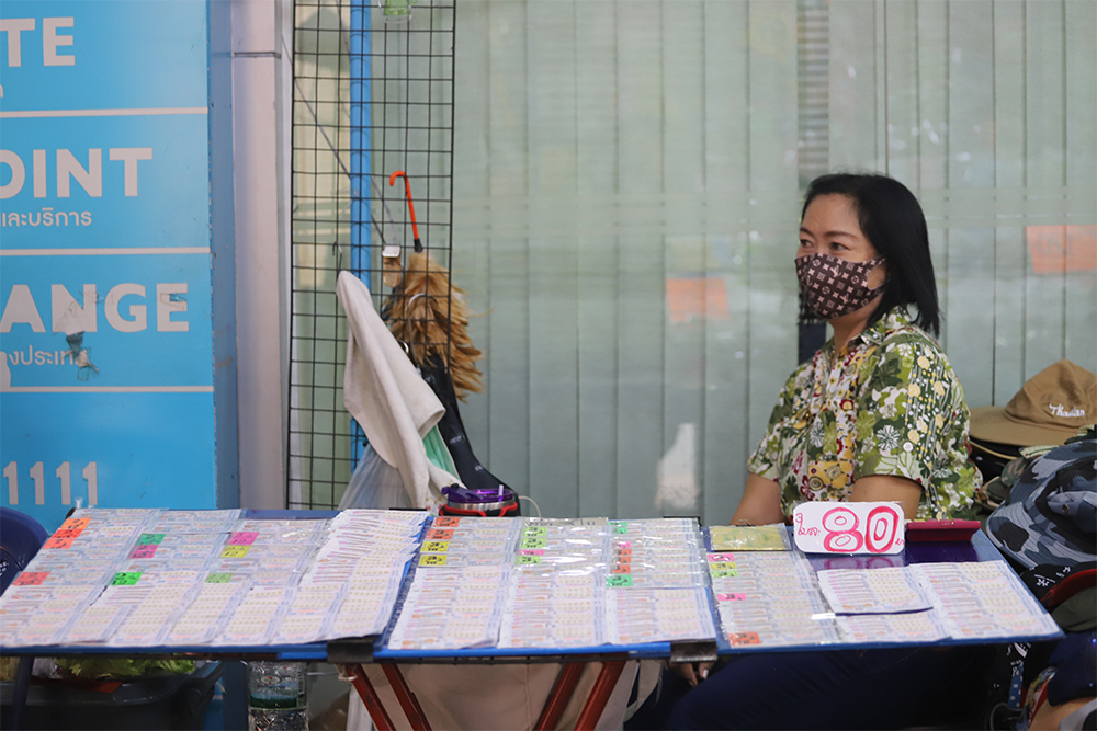 A lottery vendor on Thep Rak Road in Bangkok's Bang Khen district on April 15, 2020.