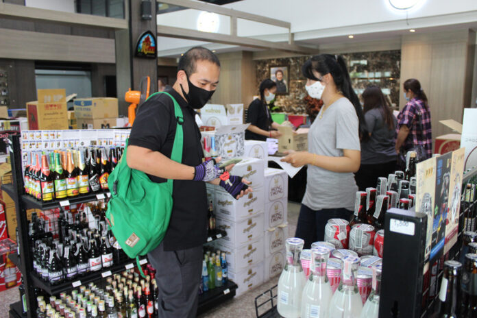 Shoppers at Seriwat Alcohol shop on April 10, 2020 in Korat city.