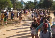 Overstay Amnesty Cleared by Cabinet, Awaiting PM’s Final Approval People queue up at a temporary immigration office on Koh Phangan on April 8, 2020. Photo: Richard Barrow / Twitter
