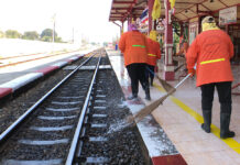 Prachuap Officials Donate Full Salaries to COVID-19 Rescue Workers Workers disinfect Hua Hin Railway Station on April 1, 2020.