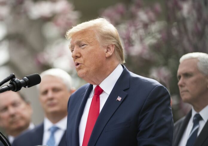 U.S. President Donald Trump (Front) addresses a news conference at the White House in Washington D.C., the United States, on March 13, 2020. (Xinhua/Liu Jie)