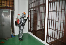 Police Will Seek Max Punishment for Decree Violators A jail inside Bang Khen Police Station being disinfected on March 30, 2020.