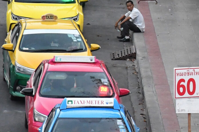 A file photo of taxis in Bangkok.