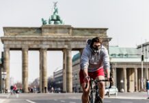 Europe, U.S. Slowly Adopting Mask-Wearing Against COVID-19