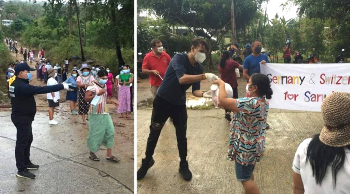 Germans and Swiss expats give out food April 24, 2020 on Koh Samui.