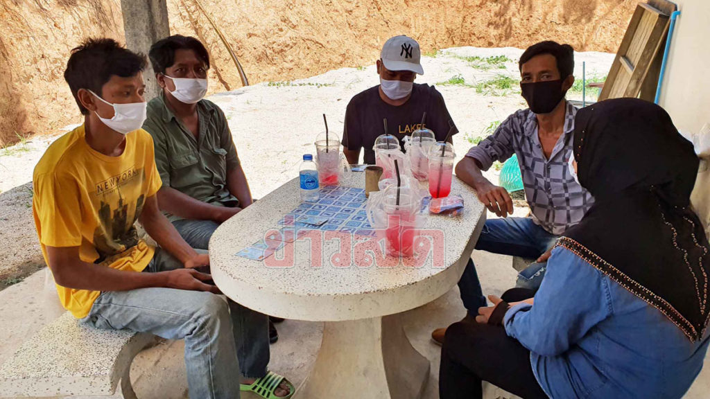 Workers take a rest at a checkpoint after they were refused entry into the province on April 19, 2020.