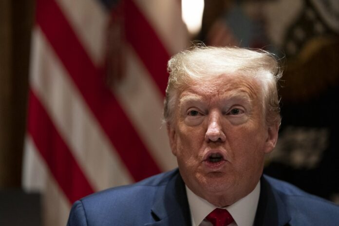 President Donald Trump speaks during a meeting with Arkansas Gov. Asa Hutchinson, and Kansas Gov. Laura Kelly, in the Cabinet Room of the White House, Wednesday, May 20, 2020, in Washington. Photo: Evan Vucci/ AP