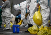 Suing China Over COVID-19 ‘Against International Law’ A medical worker disinfects a box containing COVID-19 samples for nucleic acid test at the center for disease control and prevention in Fengman District of Jilin City, northeast China's Jilin Province, May 17, 2020. Photo: Yan Linyun / Xinhua