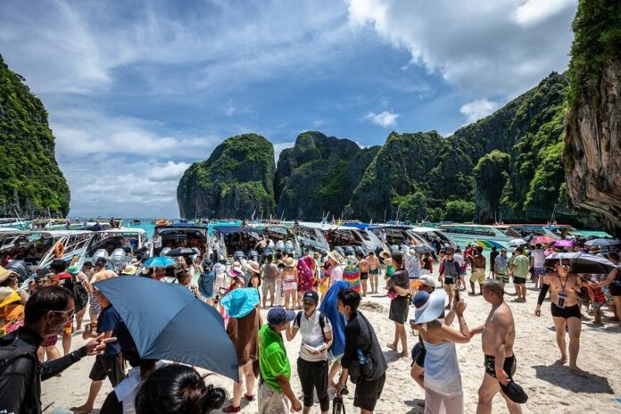 A file photo of tourists crowding Maya Bay in southern Thailand.