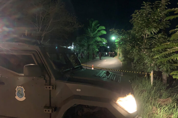 Security officials inspect the scene of a fatal shooting in Saiburi district where two paramilitary rangers were killed on May 3, 2020.