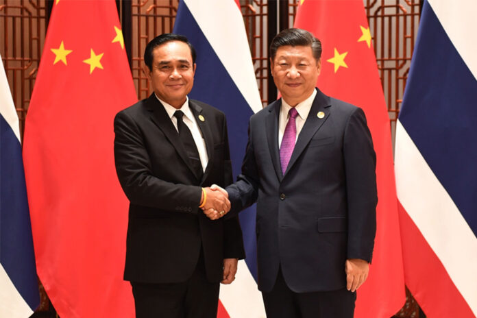 Prime Minister Prayut Chan-o-cha and Chinese president Xi Jinping during BRICS Summit in Xiamen, China on Sept. 5, 2017.