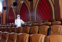 Spas, Gyms, Cinemas Among Venues To Be Shut in Bangkok A worker disinfects cinema seats in Bangkok.