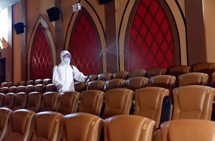 Spas, Gyms, Cinemas Among Venues To Be Shut in Bangkok A worker disinfects cinema seats in Bangkok.