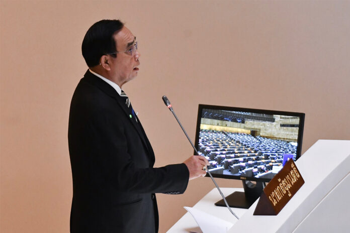 PM Prayut Chan-o-cha addresses the Parliament on May 27, 2020. PM Prayut Chan-o-cha addresses the Parliament on May 27, 2020.