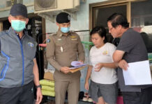 Woman Accused of Poisoning Son for Donation Money Nittha Wongwan, second from the right, during her arrest on May 18, 2020.