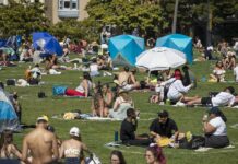Mask-Wearing Still a Controversy in Virus-Stricken U.S.