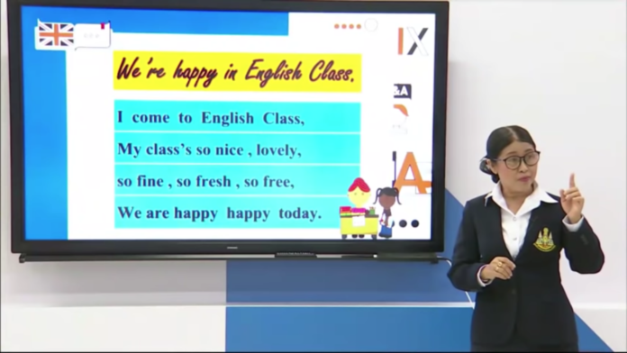 Kru Wang teaches an online English course.