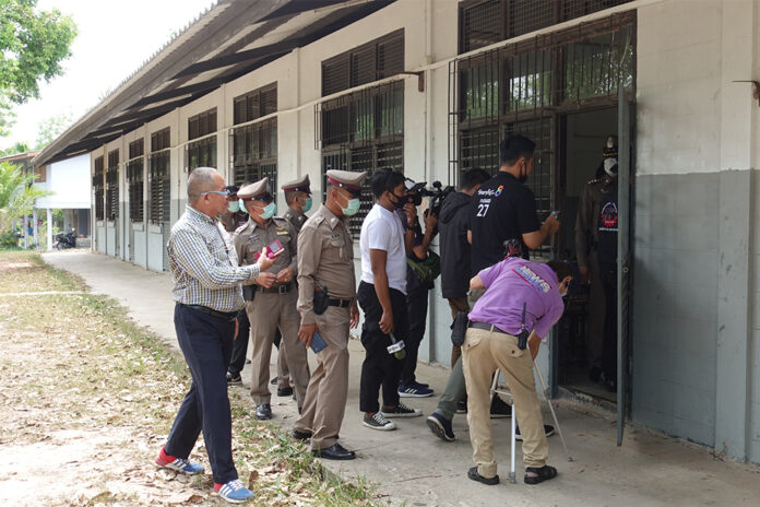 Police investigate a classroom at Dongmon Wittayakhom School in Mukdahan province where one of the sexual attacks reportedly took place.